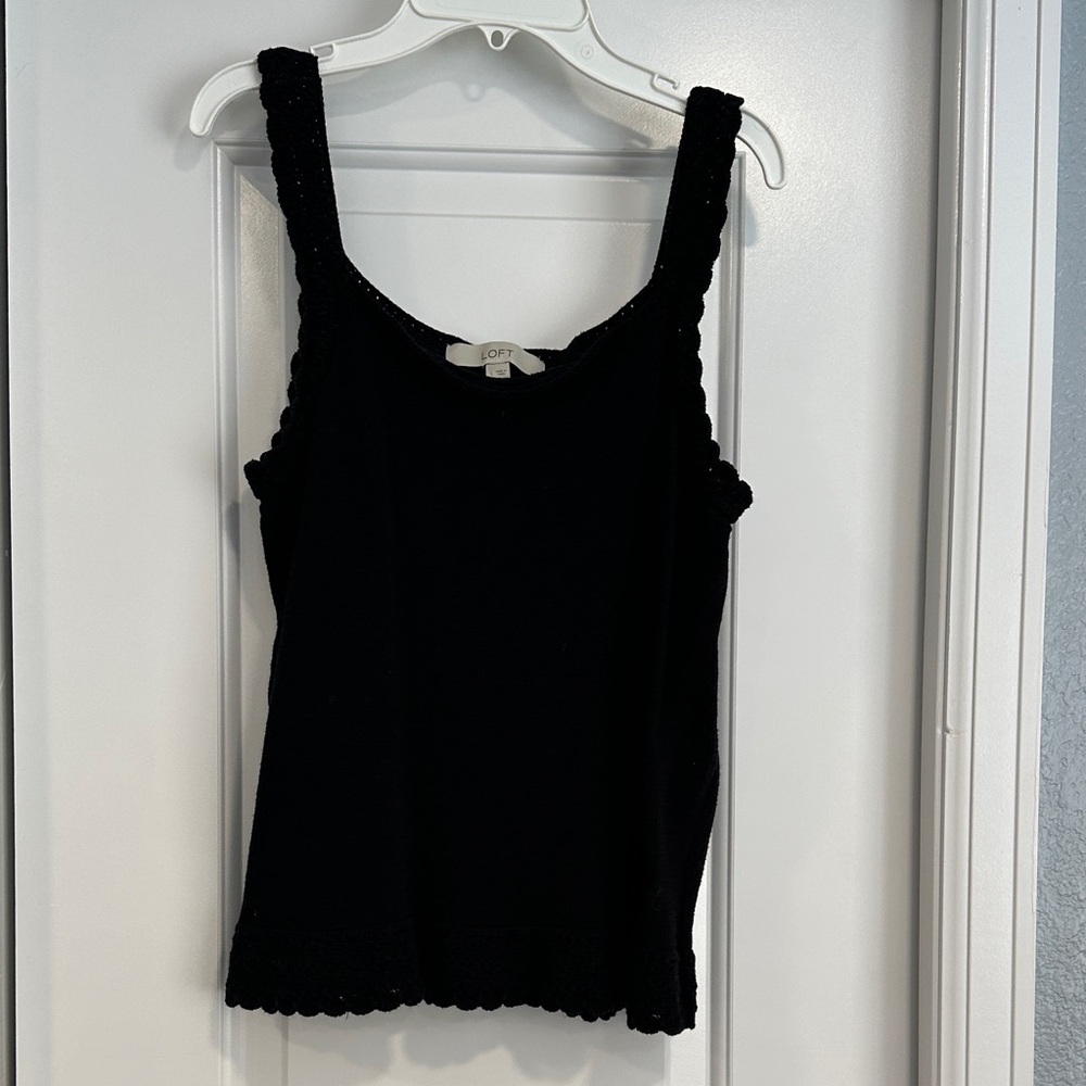 Black knitted Loft tank top with detailed design on straps and bottom.size large